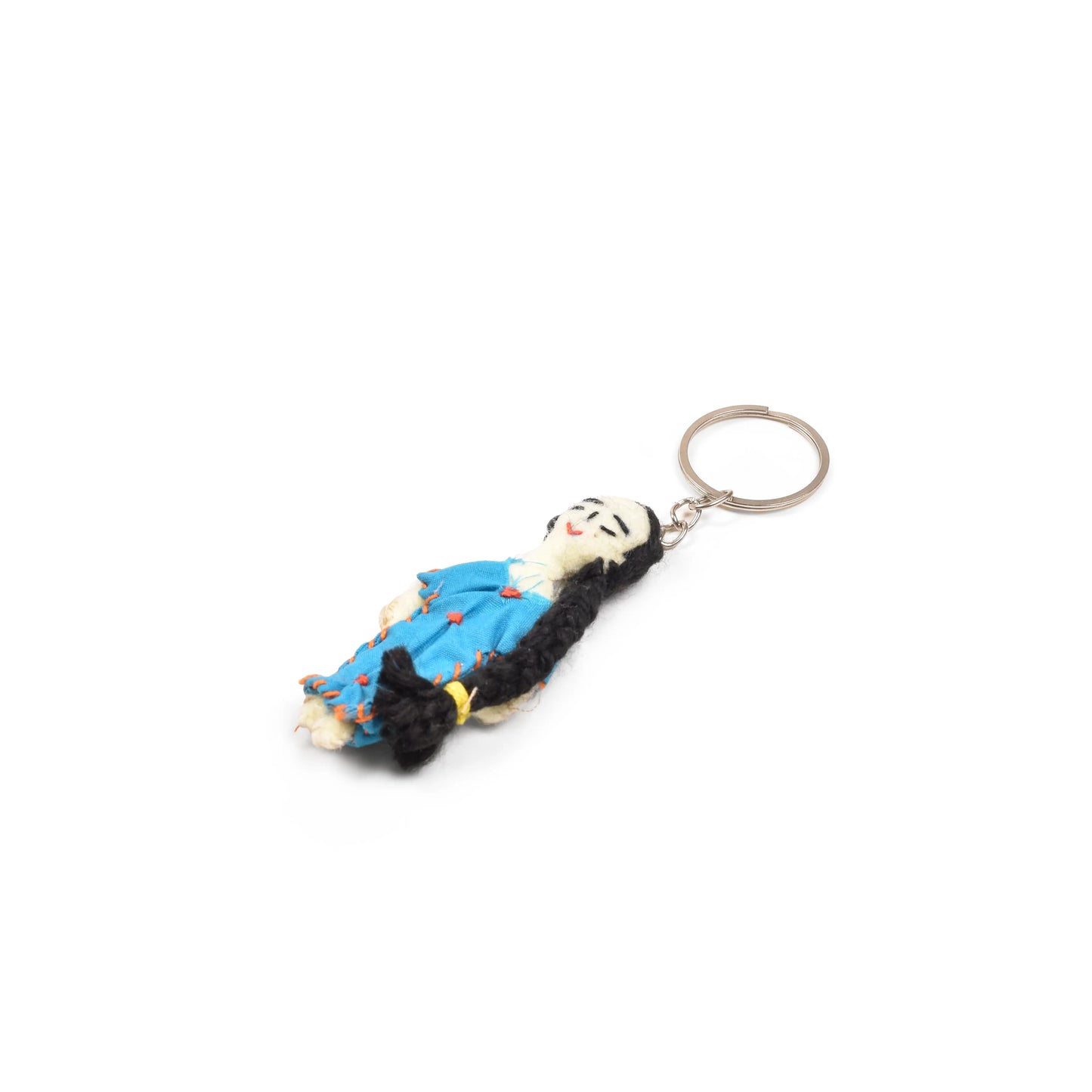 Keychain with a figurine of a woman in a  dress 