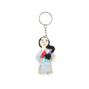 Doll Keychain with a figurine of a woman in a gray dress 